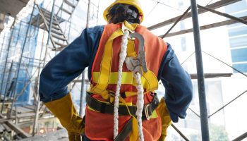 back-view-man-with-safety-equipment